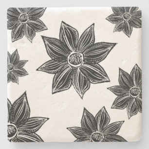 Svart och vitt med tropisk blomma stenunderlägg