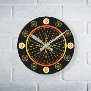 Svart orange av cykelhjul rund klocka