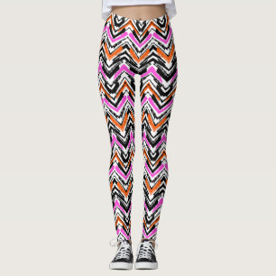 Svart, orange och rosa hand plockadesparremönster leggings