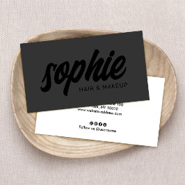 Svart på svartvitt handskrivet penselskript visitkort