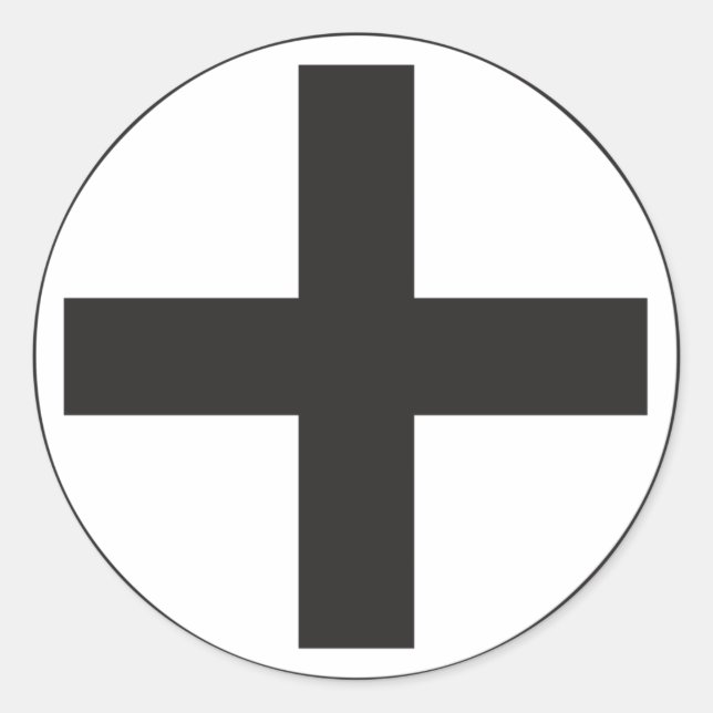 Svart plustecken runt klistermärke (Framsida)