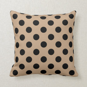 Svart polka dots på beige kudde