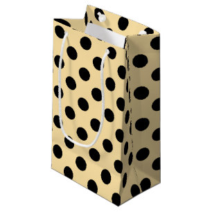 Svart polka dots på blekens gult