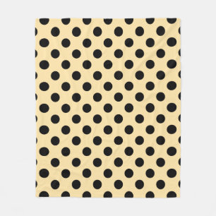Svart polka dots på blekens gult fleecefilt