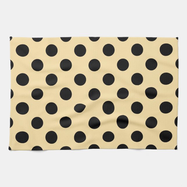 Svart polka dots på blekens gult kökshandduk (Horisontell)