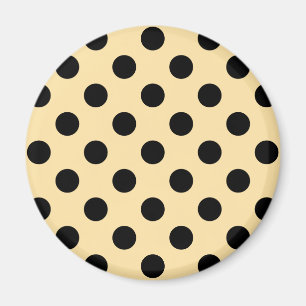 Svart polka dots på blekens gult magnet
