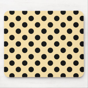 Svart polka dots på blekens gult musmatta