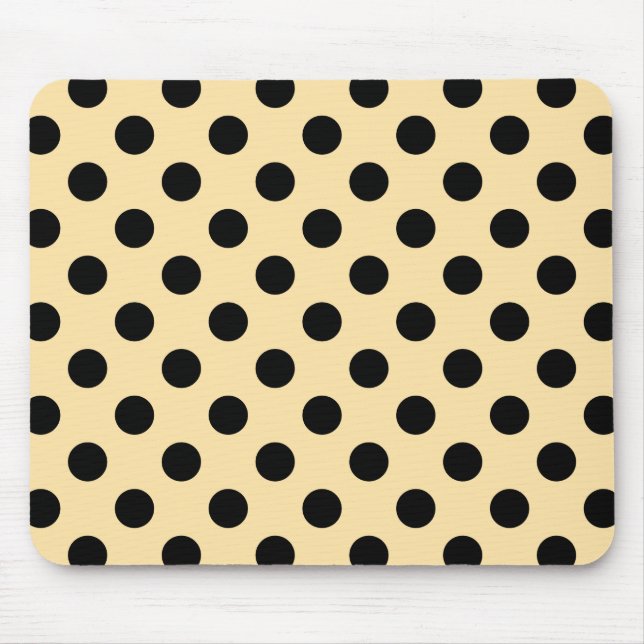 Svart polka dots på blekens gult musmatta (Framsidan)