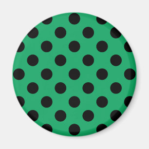 Svart polka dots på färsk grönt magnet