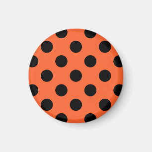 Svart polka dots på orange magnet