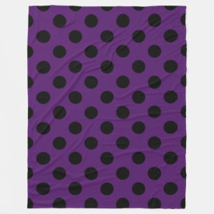 Svart polka dots på plommonets lila fleecefilt