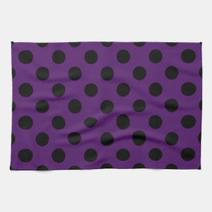 Svart polka dots på plommonets lila kökshandduk