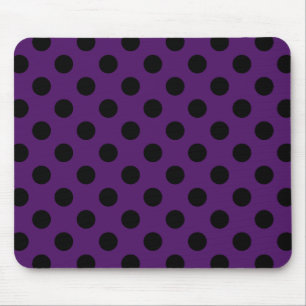 Svart polka dots på plommonets lila musmatta