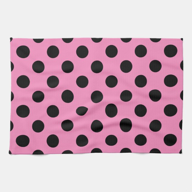 Svart polka dots på rosa kökshandduk (Horisontell)