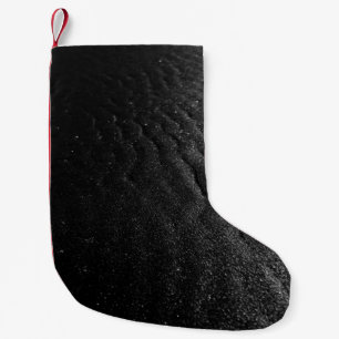Svart sand liten julstrumpa