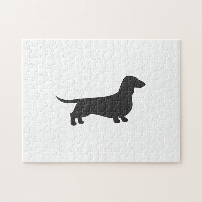 Svart silhuett av dachshund pussel (Horisontell)