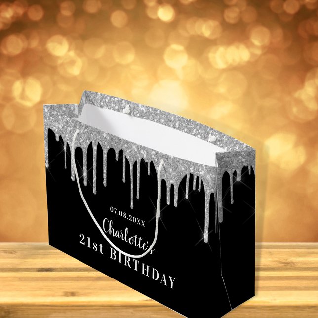 Svart silver droppar i glitter i namn (Skapare uppladdad)