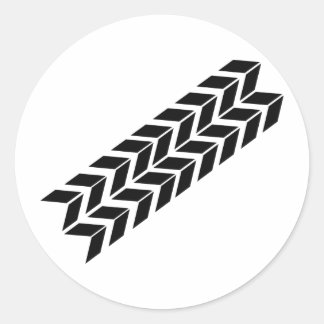 svart skidmarksymbol runt klistermärke