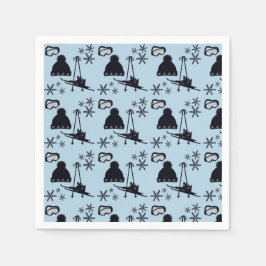 Svart skidutrustning och snöflingor på blå skidutr pappersservett