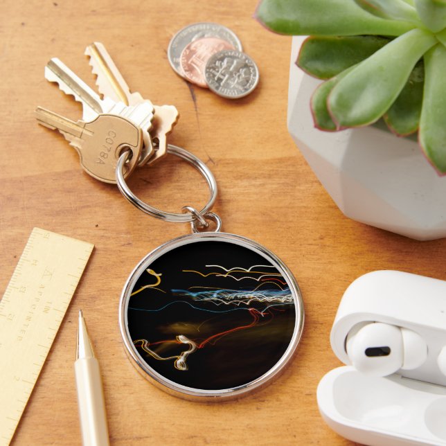 svart skytte rund silverfärgad nyckelring (Skrivbord)