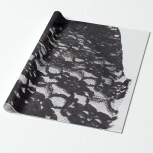 Svart snöre som slår in papper presentpapper