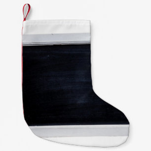 Svart svarta svarta svarta tavla liten julstrumpa