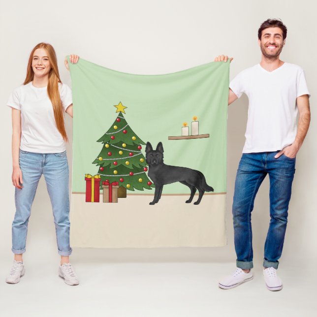 Svart tysk schäferhund och festlig julgran fleecefilt (På plats)