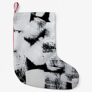 Svart vit, abstrakt målad duk. liten julstrumpa