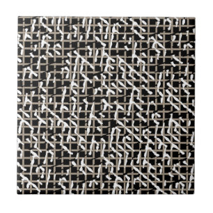 Svart vit och beigen texturerade keramiska kakelplatta