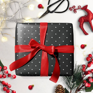 Svart-vit prickig julpresentpapper presentpapper