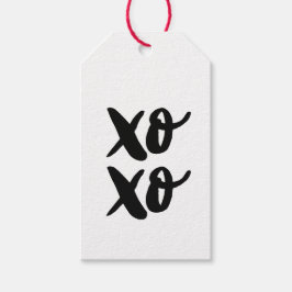 Svart XO XO. Valentines day. Hugs och kyssar Presentetikett
