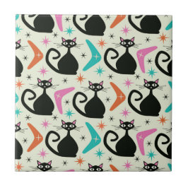 Svarta atomkatter i mitten med bommarisangar kakelplatta