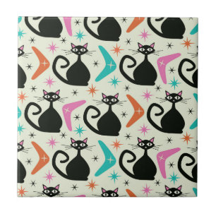 Svarta atomkatter i mitten med bommarisangar kakelplatta