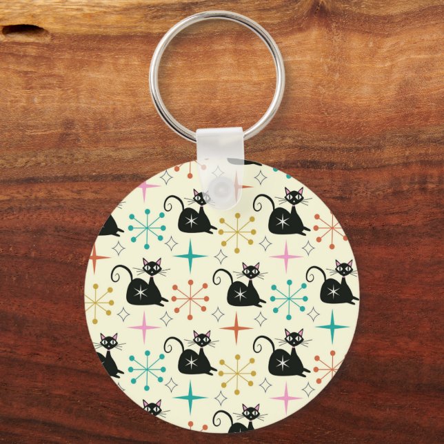 Svarta atomkatter i mitten med Retro Starburst Nyckelring (Baksida)