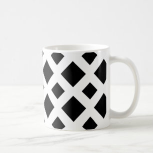Svarta diamanter på vitt kaffemugg