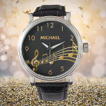 Svarta guld musik noter namn armbandsur<br><div class="desc">Enkel och elegant för musiken älskare eller musiker! Svart bakgrund med faux guld musik noter. Mall för ditt namn,  golden brev. Golden klocka nummer.</div>