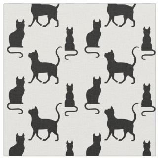 Svarta katter/katt-/kattungesilhouette på vit tyg