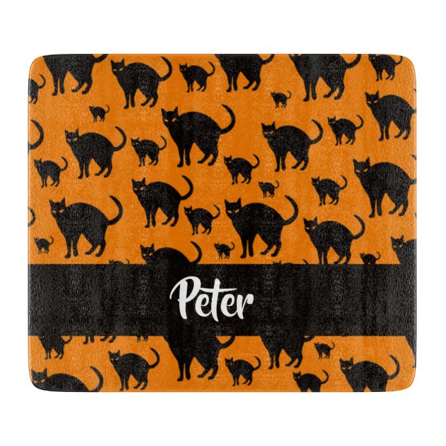 Svarta katter på orange (Framsidan)