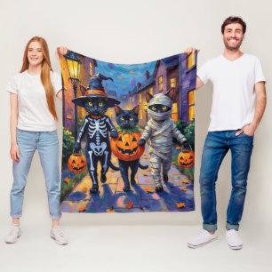 Svarta katter som söker godis på Halloween Fleecefilt
