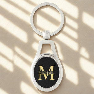 Svarta och Guld Personlig Monogram och Namn Ovalt Silverfärgad Nyckelring