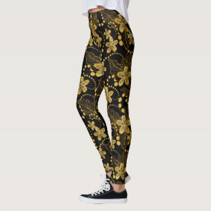 Svarta och guld tropiska löv och blommor mönster leggings