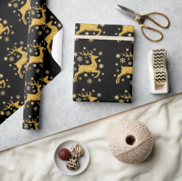 Svarta och gyllene falska folie renar och snöfling presentpapper