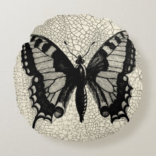 Svarta och vita fjärilar på krackade bakgrunder rund kudde (Framsidan)