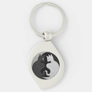 Svarta och vita katter swirl silverfärgad nyckelring
