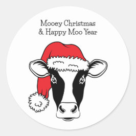 Svarta och vita kor i jultomten runt klistermärke