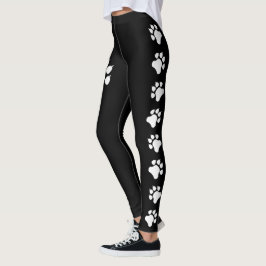 Svarta och vita silhuetter av hundens tassavtryck leggings