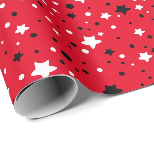 svarta och vita stjärnor på rött presentpapper (Rullad Hörn)