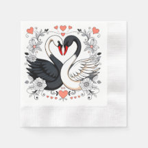 Svarta och vita svanar omgivna av blomsterdesign