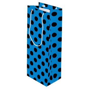 Svarta polka dots på blått himlar