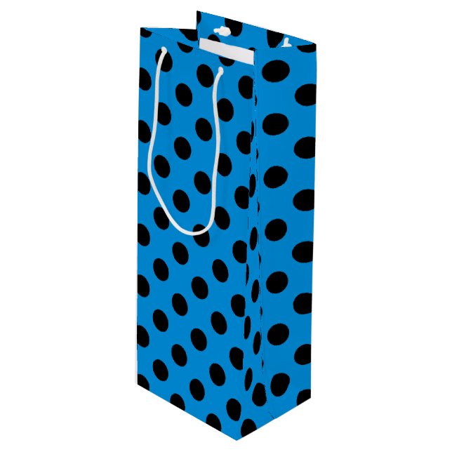 Svarta polka dots på blått himlar (Framsidan Vinklad)